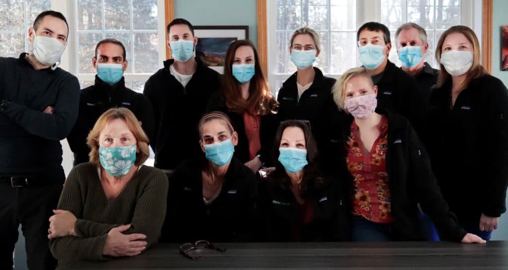 MycoScience's expert team. ISO 13485:2016 certified contract manufacturing company. Mycoscience expert team with COVID masks in the laboratory facilities
