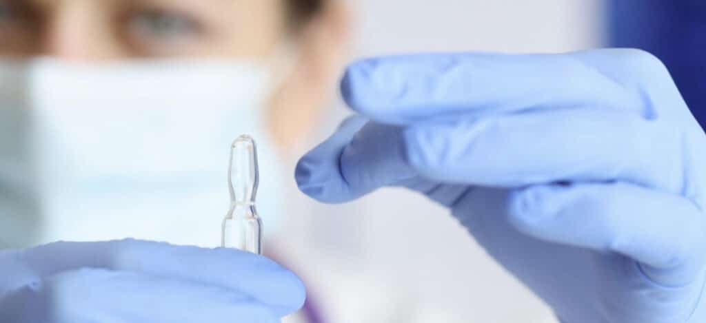 Close picture of a woman technician holding a medical instrument. Stability assays for sterile products. Stability data requirements by FDA development phase. Prefilled injectable products. Stability testing for medical devices. Sterile product types