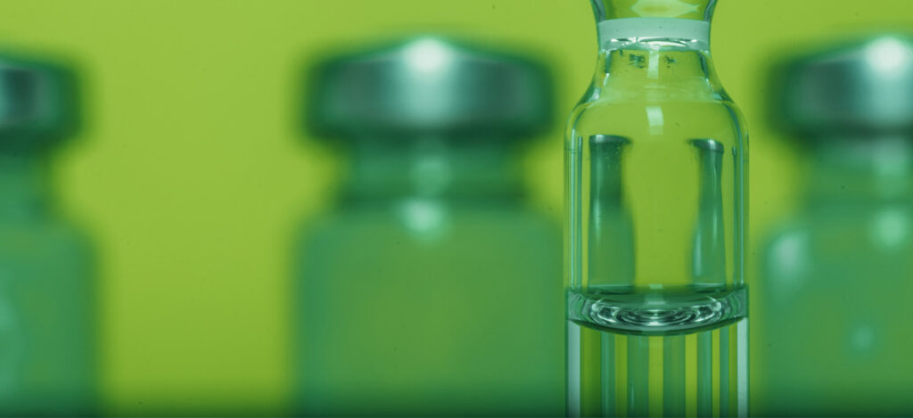 Picture of flasks and tubes on a laboratory table with a green background. Top five microorganism contaminants. Microbiology of water for parenteral products. Why is microbiology of water important. What types of microorganisms can contaminate water. Gram-negative bacteria. Gram-positive bacteria. Pharmaceutical water systems