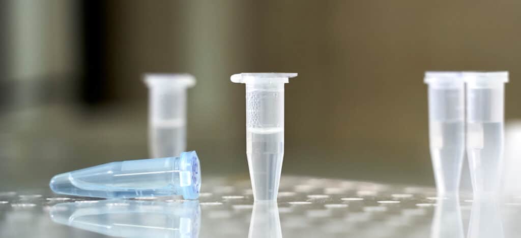 Picture of several pipettes on a laboratory table. Preservative efficacy testing vs microbiology testing. Differences between preservative efficacy and microbiology testing. What products require microbiology testing. Microbial characterization methods. Usp 61 microbiology tests. Usp 62 microbiology tests